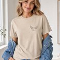 thumbnail image 3 of Jollimate En La Memoria Nadie Muere T-Shirt, Spanish Memorial Angel Wing Graphic Tee, Women's Shirt, 3 of 6