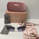 thumbnail image 1 of Miu Miu woman’s sunglasses smu 56T butterfly purple lenses, 1 of 6