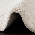 thumbnail image 5 of SAFAVIEH Fontana Jamie Solid Plush Shag Area Rug, Ivory, 6'7" x 6'7" Round, 5 of 9