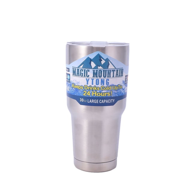 magic mountain tumbler with lid and straw, 30oz stainless steel tumbler, front-facing travel thermal cup with double-wall vacuum insulated body, clear flip-top lid and blue mountain label, tapered base and brushed silver finish on white background; suitable for hot or cold beverages and often used as a reusable travel coffee cup.