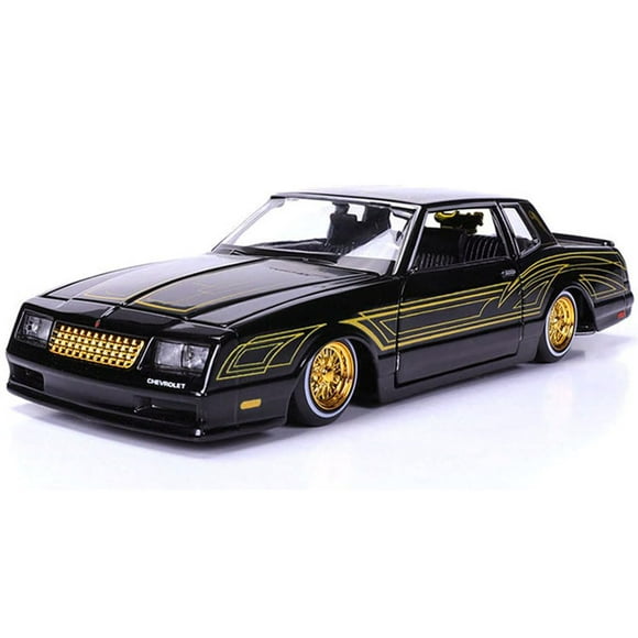 1986 Chevy Monte Carlo SS Lowrider Black Metallic with Gold Graphics and Wheels Lowriders Series 1/24 Diecast Model Car by Maisto 32542BK