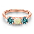 thumbnail image 3 of Gem Stone King 18K Rose Gold Plated Silver White Ethiopian Opal and Blue Moissanite Engagement Ring for Women | 1.30 Cttw | Round Cabochon 5MM | Gemstone October Birthstone | Size 9, 3 of 6