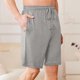 thumbnail image 3 of Pantalones Cortos de Cintura Elástica para Hombre Color Sólido Casual Beach Shorts de Verano con Botón, Algodón de Poliéster, 3 of 7
