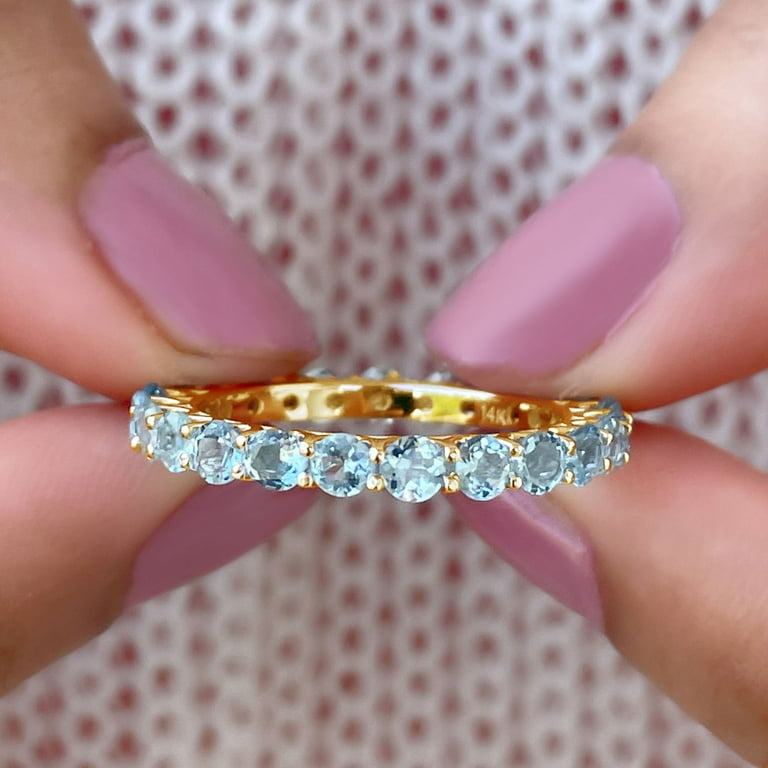 Aquamarine eternity on sale ring yellow gold
