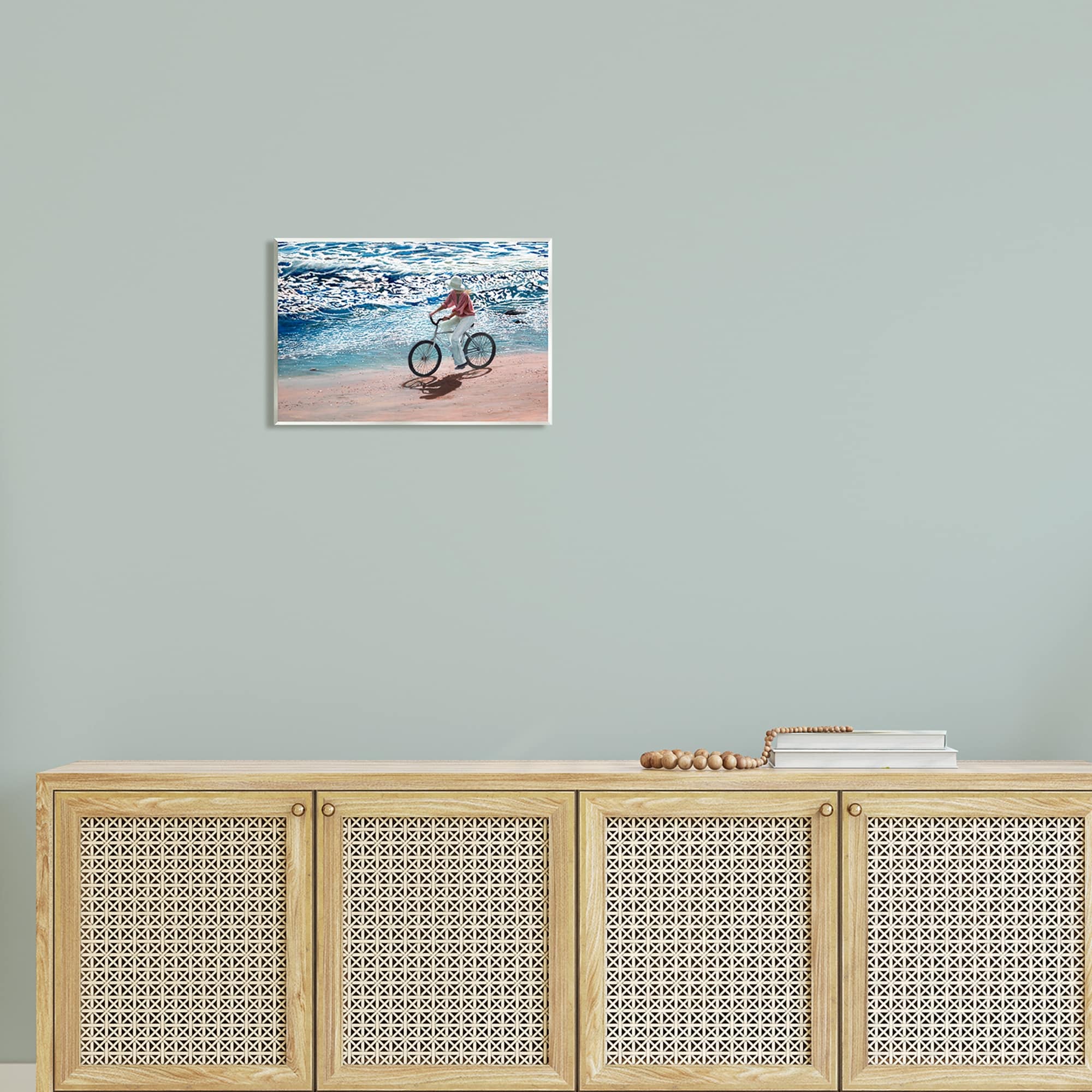 Stupell Industries Woman Riding Bicycle Coastal Beach Shoreline Landscape Painting Unframed Art Print Wall Art, Design by Tom Mielko