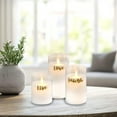 thumbnail image 2 of LumaBase Battery Operated LED Glass Candles with Moving Flame, Live Laugh Love - Set of 3 (White Wax with White Lights), 2 of 6