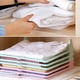 thumbnail image 1 of TABLETREANDS 3Ud Doblador De Ropa De Plástico Ligero En Verde Claro Para Camisetas Y Organizador Antirrugas, 1 of 8