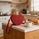 thumbnail image 5 of Bolso bandolera con forma de corazón para mujer | Bolso de hombro de piel sintética | Bolso compacto para teléfono, cartera y cosméticos | Correa ajustable para uso casual de día o de noche, 5 of 7
