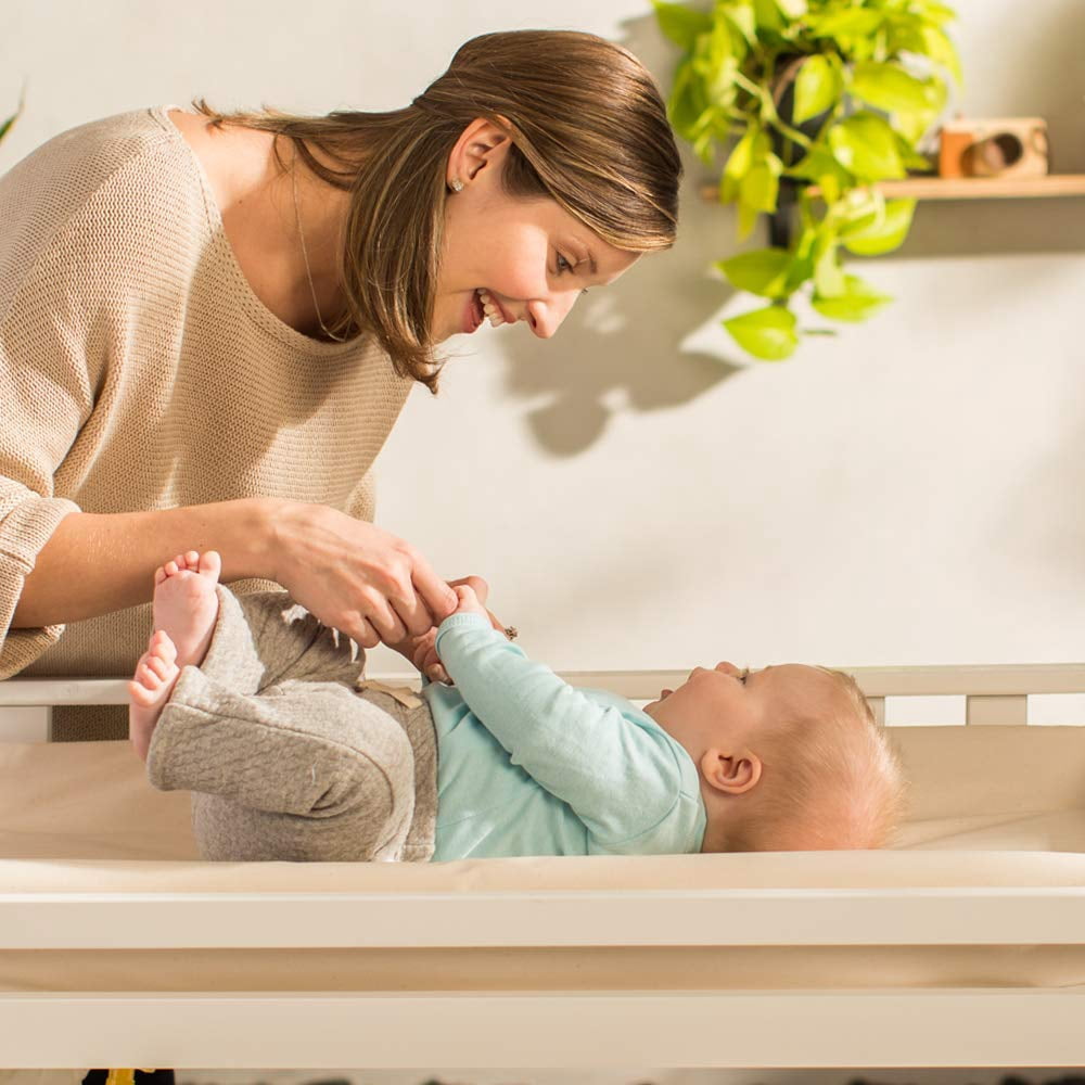 Naturepedic Organic Contoured Changing Pad - Easy to Clean, Lightweight & Portable - Comfort 2-Sided Waterproof Baby Diaper Changing Pad for Dresser or Changing Table - 16" x 31"