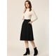 thumbnail image 2 of Falda a media pierna elástica con bolsillos de ante sintético para mujer con cinturón Negro XS, 2 of 6