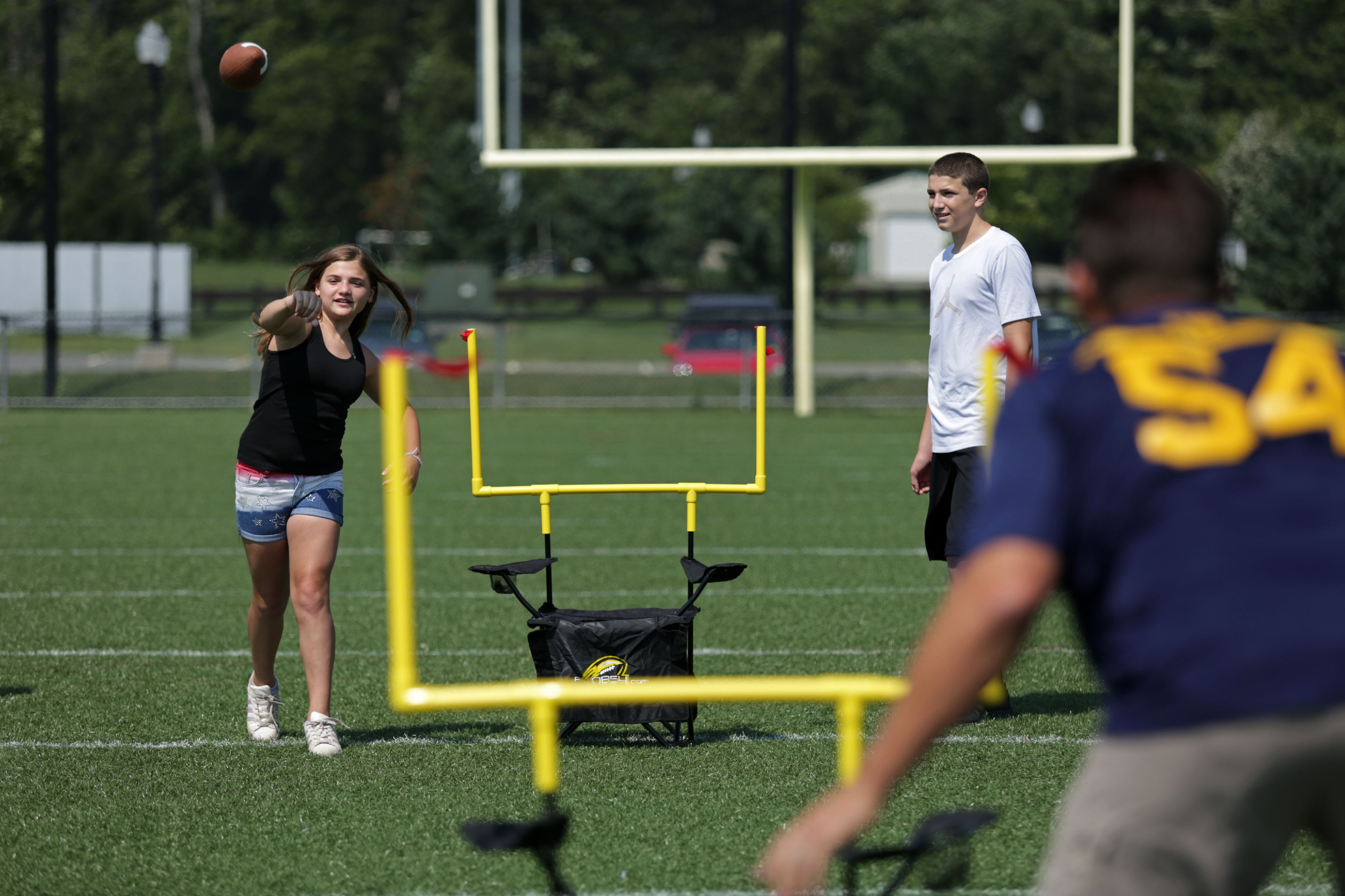 QB54 Ultimate Tailgating, Beach, Backyard, Family Fun Game - Football Toss & Kick Game Built into Two Camping Chairs