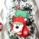 thumbnail image 5 of Medias navideñas (juego de 4): incluye muñeco de nieve, oso polar, Papá Noel y reno, rojo y verde, con detalles en copos de nieve, 5 of 5