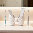 thumbnail image 6 of White Bow Toothbrush Holder with Bow Accent for Stylish Bathroom Organization, 6 of 8