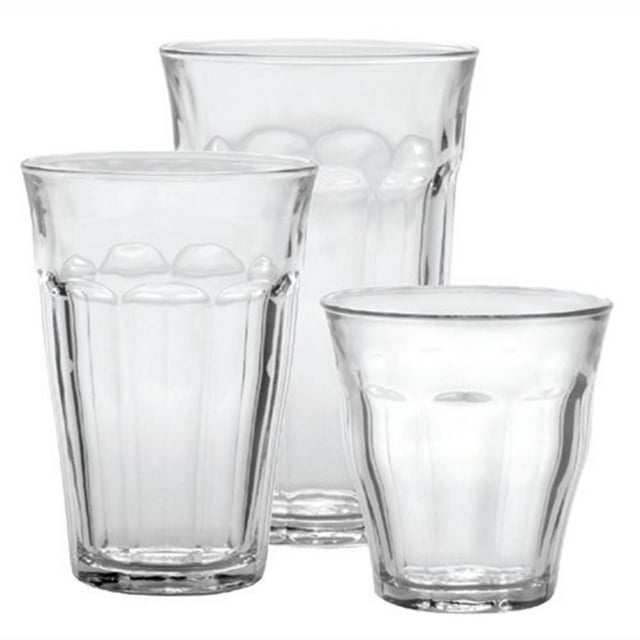 Duralex Picardie Clear 18 Piece Tempered Tumblers Set showing three clear, stackable French tempered glass tumblers with faceted sides and hemmed lips, designed for thermal shock resistance and hygienic durability, suitable for everyday drinkware use.