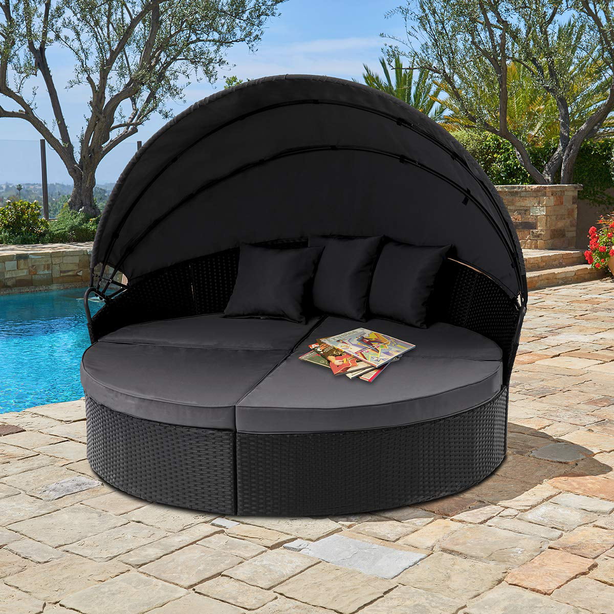 Cozy patio furniture on luxury outdoor patio. Overview of upscale patio  set, dark wicker luxury furniture with comfortable 