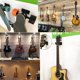 thumbnail image 3 of Soporte de pared para guitarra, paquete de 3 ganchos de guitarra para pared, soporte de gancho de guitarra negro para bajo eléctrico acústico y más, 3 of 5