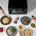 thumbnail image 2 of Farberware Countertop Microwave 700 Watts, 0.7 Cu. Ft. - Microwave Oven With LED Lighting and Child Lock - Perfect for Apartments and Dorms - Easy Clean Grey Interior, Retro Black, 2 of 5