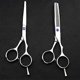 thumbnail image 1 of Juego de tijeras profesionales para cortar el cabello de 14 cm (5,5 pulgadas) de acero japonés con tijeras de entresacar para salón y uso doméstico., 1 of 5