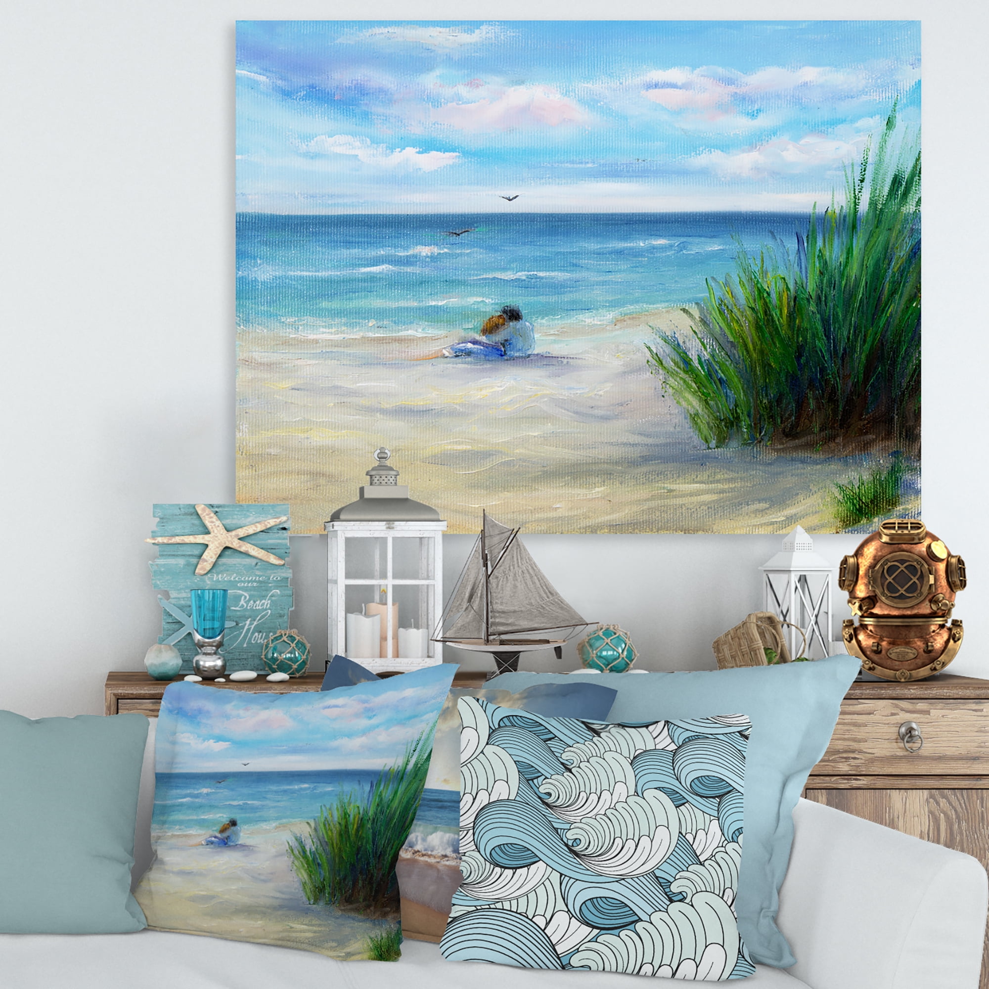 Designart ' Couple Sitting In Love By The Beach ' Nautical & Coastal Canvas Wall Art Print