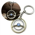thumbnail image 1 of 1948-58 Petri 2 Spoke Beige Banjo Steering Wheel Keychain - Sun & Moon Button, 1 of 1