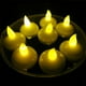 thumbnail image 4 of GOOHOCHY 12 piezas impermeables decorativas, pequeñas velas flotantes de LED para banquete de bodas, baño de SPA (luz blanca cálida), 4 of 7
