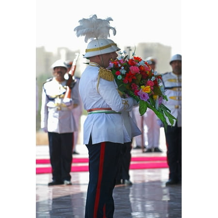 Flowers From Iraq Canvas Print The Iraqi Honor Guard stands ready to place flowers at the Monument of the Unknown Soldier, Baghdad, Stretched Canvas 10 x 14 ()