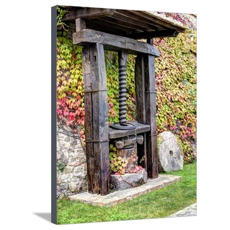 Italy, Tuscany. an Olive Oil Press on Display at a Winery in Tuscany Stretched Canvas Print Wall Art By Julie