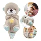 thumbnail image 1 of Bebé Dormido Con Respiración De Luz Musical Nutria Peluche, 1 of 7