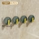 thumbnail image 1 of Juego de 4 ganchos de pared para bolsas, colgador de almacenamiento para puertas, gancho resistente sin costuras, soporte para auriculares, 1 of 5