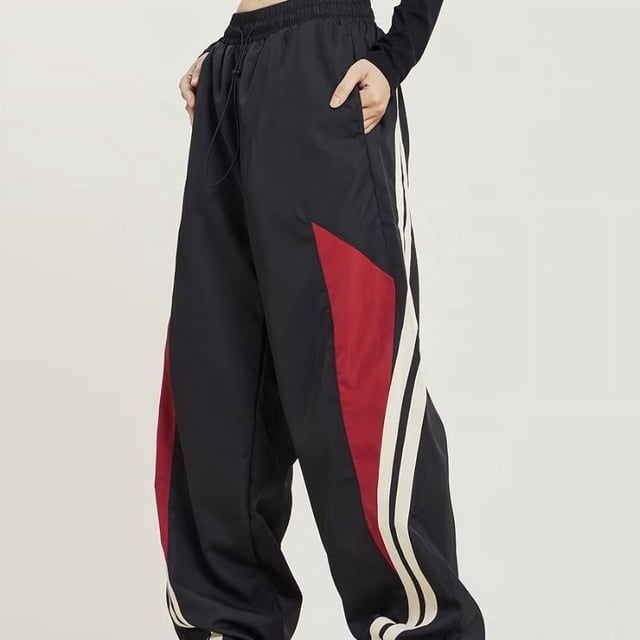 Pantalones deportivos de estilo americano retro hip-hop con rayas laterales y bloques de color para hombres y mujeres, pantalones anchos rectos y sueltos de primavera y otoño para la calle principal