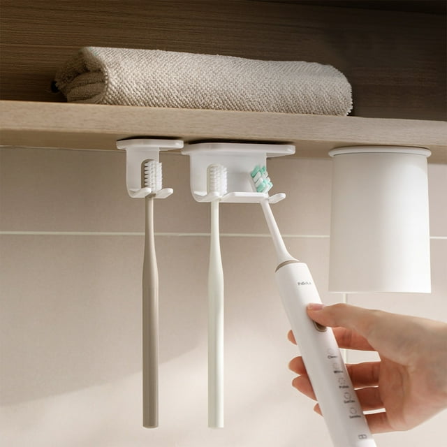 Xihbxyly Gancho para Cepillos de Dientes, Diseño Compacto, Instalación Sin Taladros, Limpieza Higiénica, Función de Secado Al Aire, Uso Versátil, Blanco, Material Plástico, 7,6 X 5 X 4,1 Cm