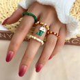 thumbnail image 1 of Conjunto de anillos con cuentas de Navidad para mujer, joyería de Feliz Año Nuevo, accesorios de regalo, árbol de Papá Noel, alce, 4 Uds./Set, novedad de 2022, 1 of 4