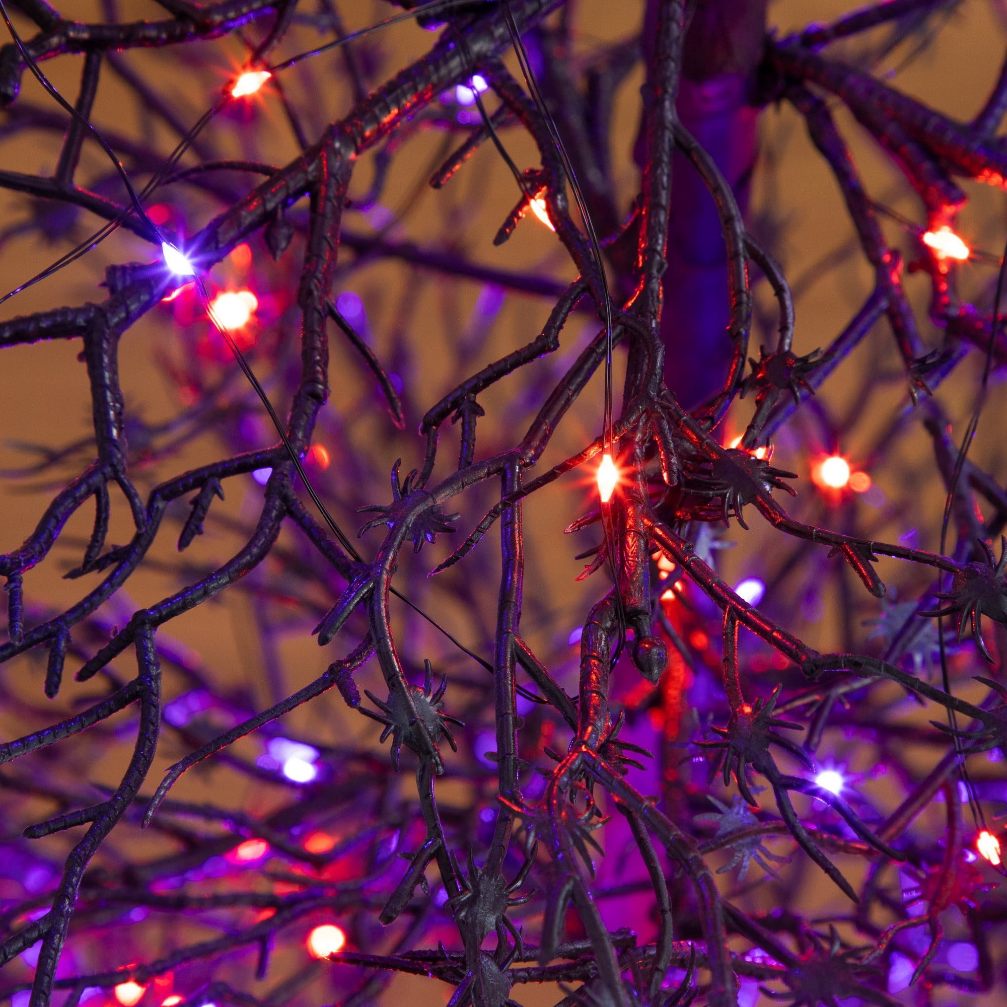 4ft. Pre-Lit Artificial Halloween Spider Twig Tree with 100 Orange & Purple LED Lights
