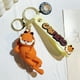thumbnail image 1 of LLavero Garfield de dibujos animados de Anime, mochila encantadora, colgante, colocación creativa, regalos de vacaciones para niños y niñas, 1 of 5