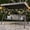 Gray, variant on YIKEMA 3-Seat Steel Canopy Porch Swing with Foldable Side Trays and Cup Holders, Brown