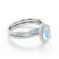 thumbnail image 3 of JeenMata Pave Halo Setting 1.75 Carat Oval Cut Blue Moonstone and Moissanite Infinity Twisted Shank Bridal Set in 18K White Gold Plating over Silver, 3 of 6