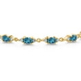 thumbnail image 2 of Gem Stone King 18K Yellow Gold Plated Silver London Blue Topaz and White Moissanite Tennis Bracelet for Women (8.11 Cttw, Gemstone Birthstone, Oval 6X4MM, 7 inch), 2 of 5