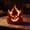 C, variant on Halloween LED Flameless Candle with Jack-o'-Lantern Face – Flickering Orange Glow on Black Pedestal, Battery-Operated Tabletop Decor for Party & Home Ambiance