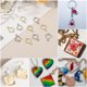 thumbnail image 5 of Uxcell 100Pcs Aleación de Pendientes de Bisel Abierto, Colgante de Marco Hueco en Forma de Corazón, Dorado, 5 of 6