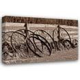 thumbnail image 1 of C. Thomas McNemar 44x31 Gallery Wrapped Canvas Wall Art Titled - Antique Wagon Wheels I, 1 of 4