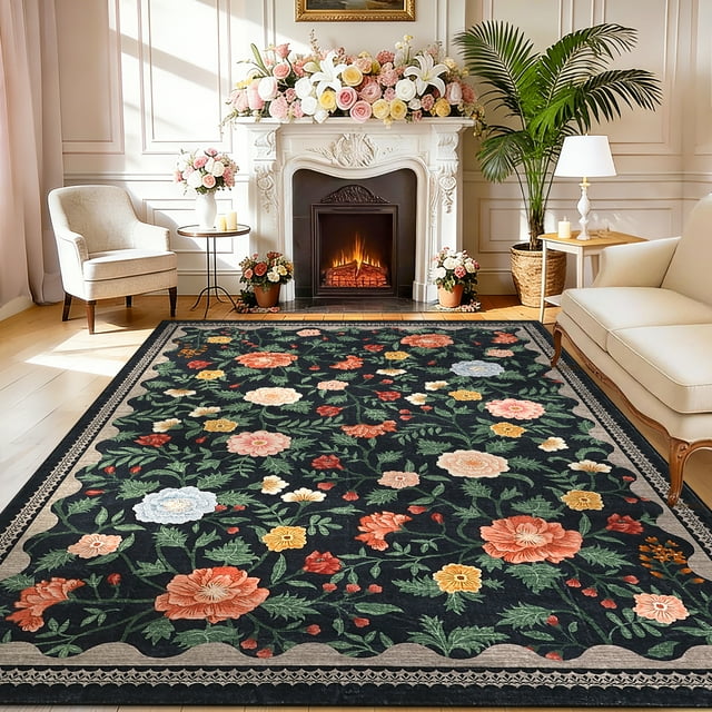 Garvee 5'x7' Vintage Floral Area Rug with a black base and vibrant floral patterns, designed for living rooms, bedrooms, or dining areas. This washable rug features a soft low pile texture, non-slip backing, and stain-resistant material, blending farmhouse, boho, and traditional styles. Displayed in a cozy living room with a fireplace and elegant decor.