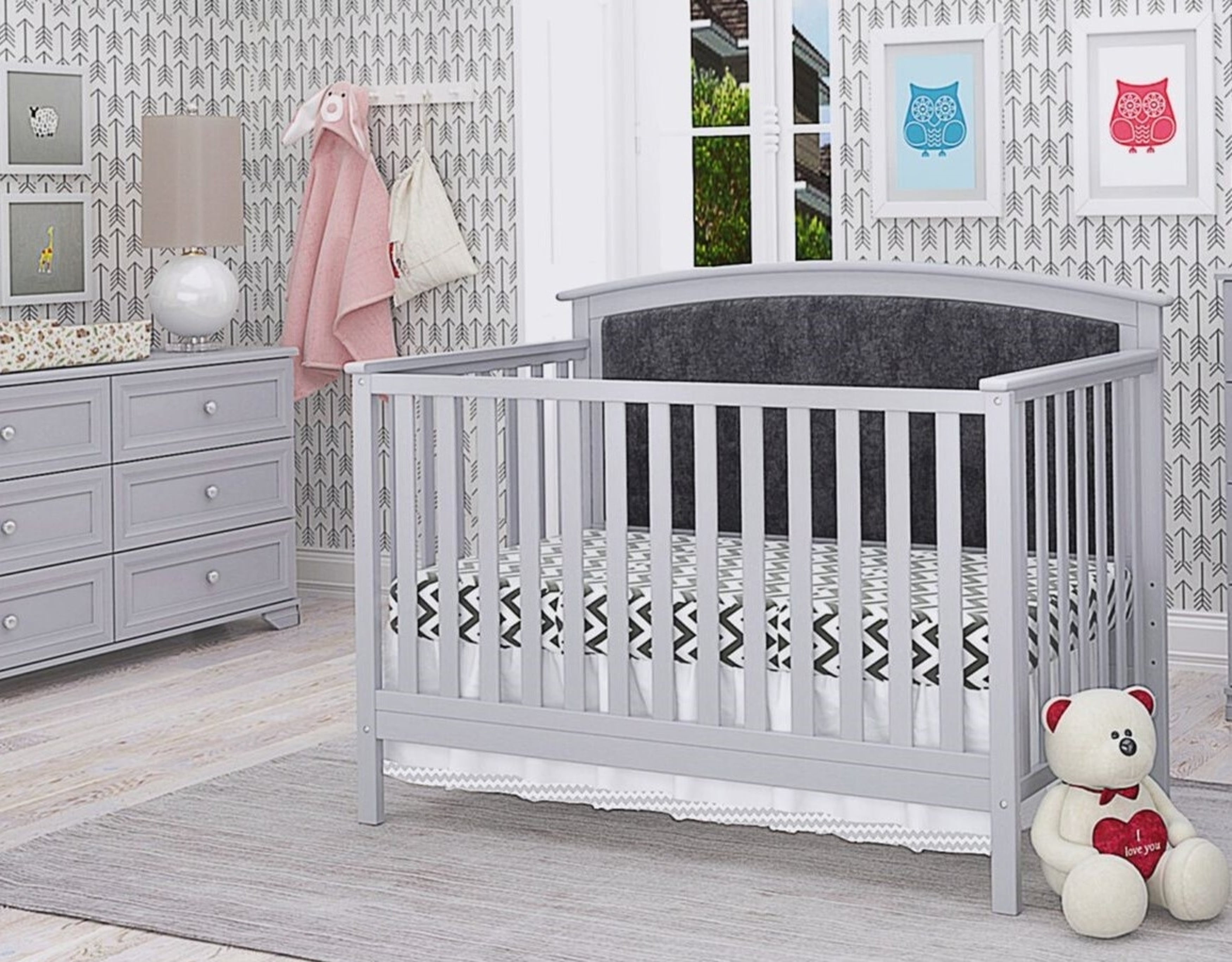 creola portable upholstered crib with mattress and storage