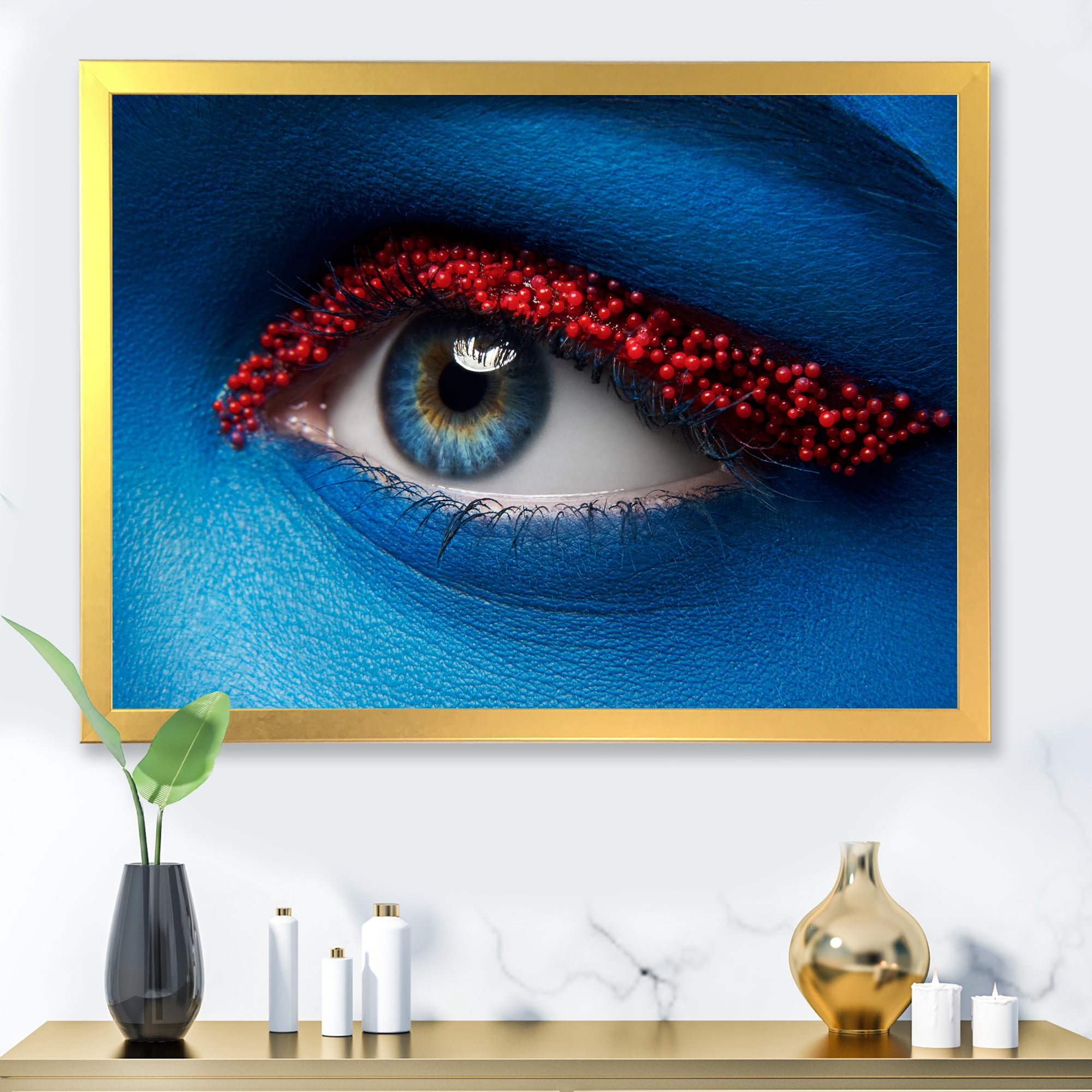 Designart 'Woman Eye With Blue Paint On Face & Red Balls' Modern Framed Art Print