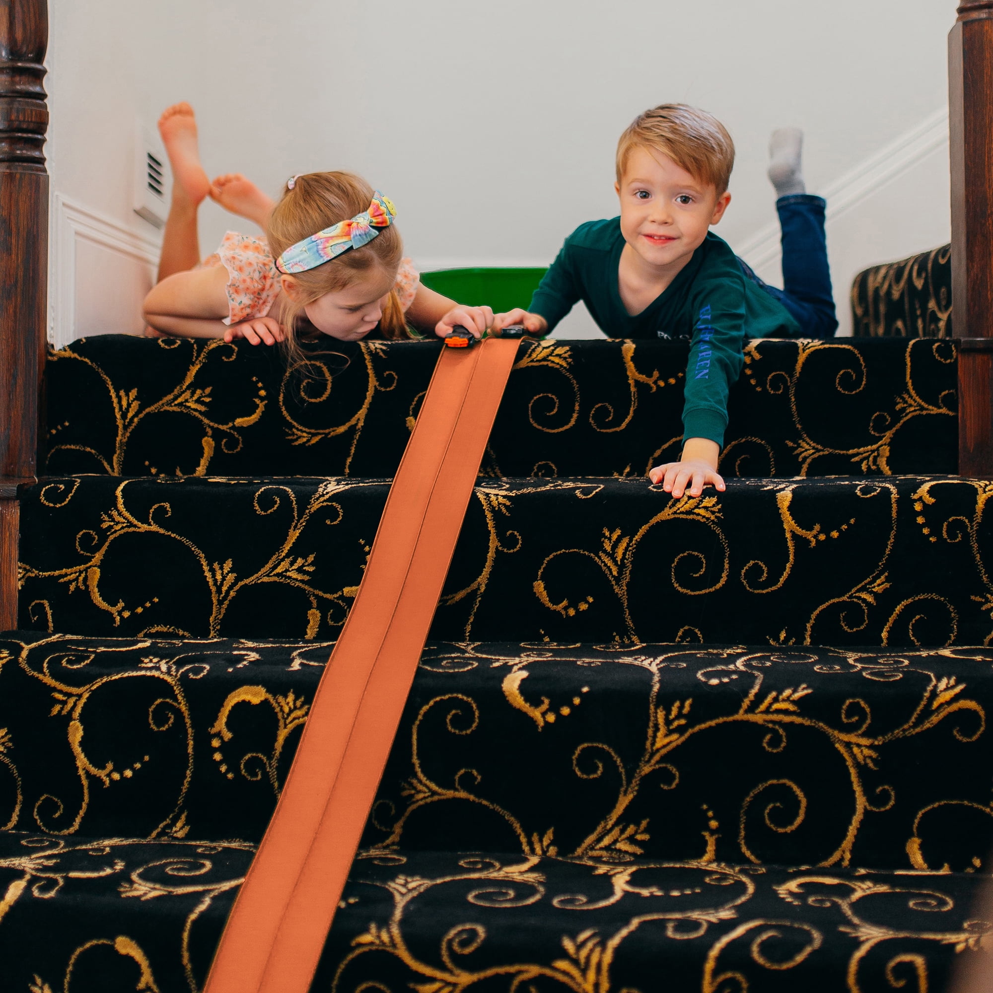 Valchemist FlexTrack 5000 Orange Track for Toy Cars Flexible Race Track for Kids with Suction Cups Compatible with Hot Wheels Matchbox and Diecast 1/64th Car 15 Feet Long Rolls Up Portable Racetrack