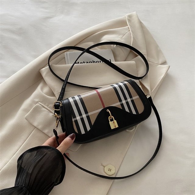 Bolso de mano francés de estilo nicho, popular este año, con un solo hombro, bandolera cuadrada pequeña con diseño a cuadros en contraste, bolso de mujer con cierre retro sencillo.