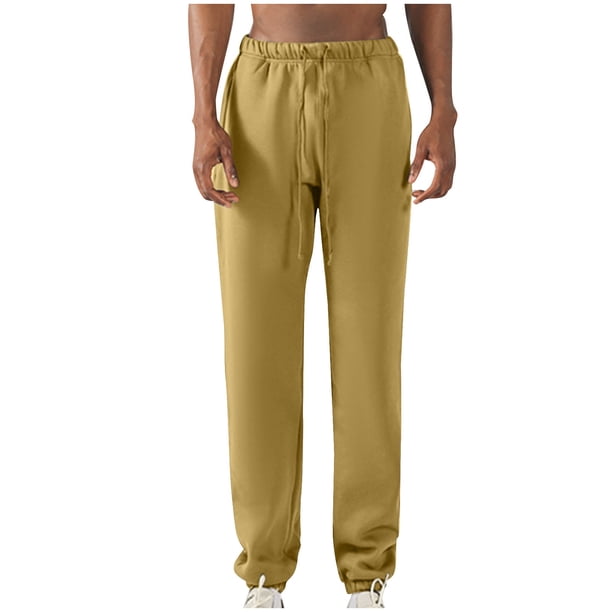 Pantalones largos para hombre, con cintura elástica, color liso, con cordón y bolsillos, de poliéster.