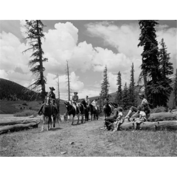 Posterazzi SAL255421155 People Horseback Riding in Hilly Landscape Poster Print - 18 x 24 in.