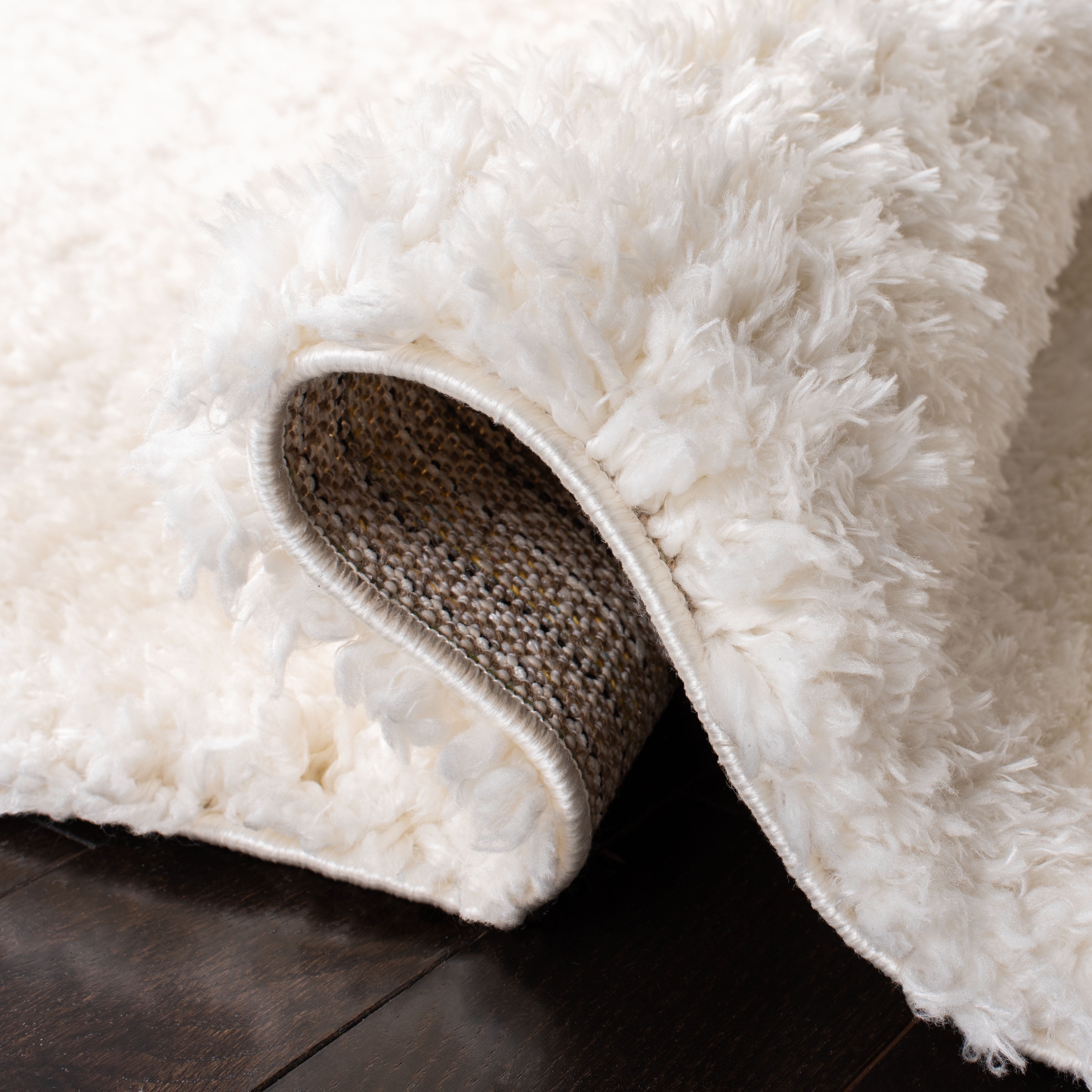 SAFAVIEH Madrid Miah Solid Polyester Shag Runner Rug, Ivory, 2' x 10'