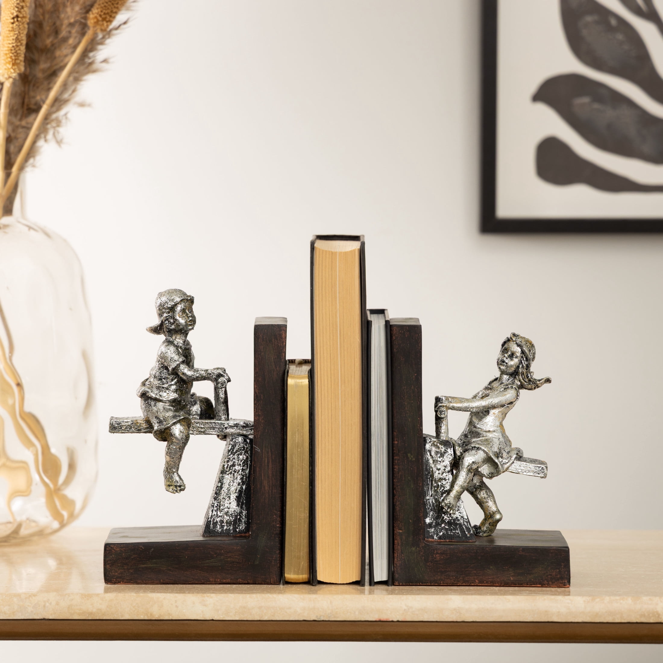 DecMode 4" People Brown Polystone Bookends with Swing Set (Set of 2)
