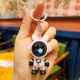 thumbnail image 1 of Llavero con forma de astronauta y conejo con forma de estrella errante, llavero creativo para coche, colgante para pareja, regalo, bolsa para freír, adornos colgantes, 1 of 2